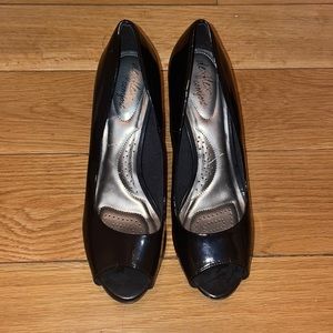 Open-toed black stilettos